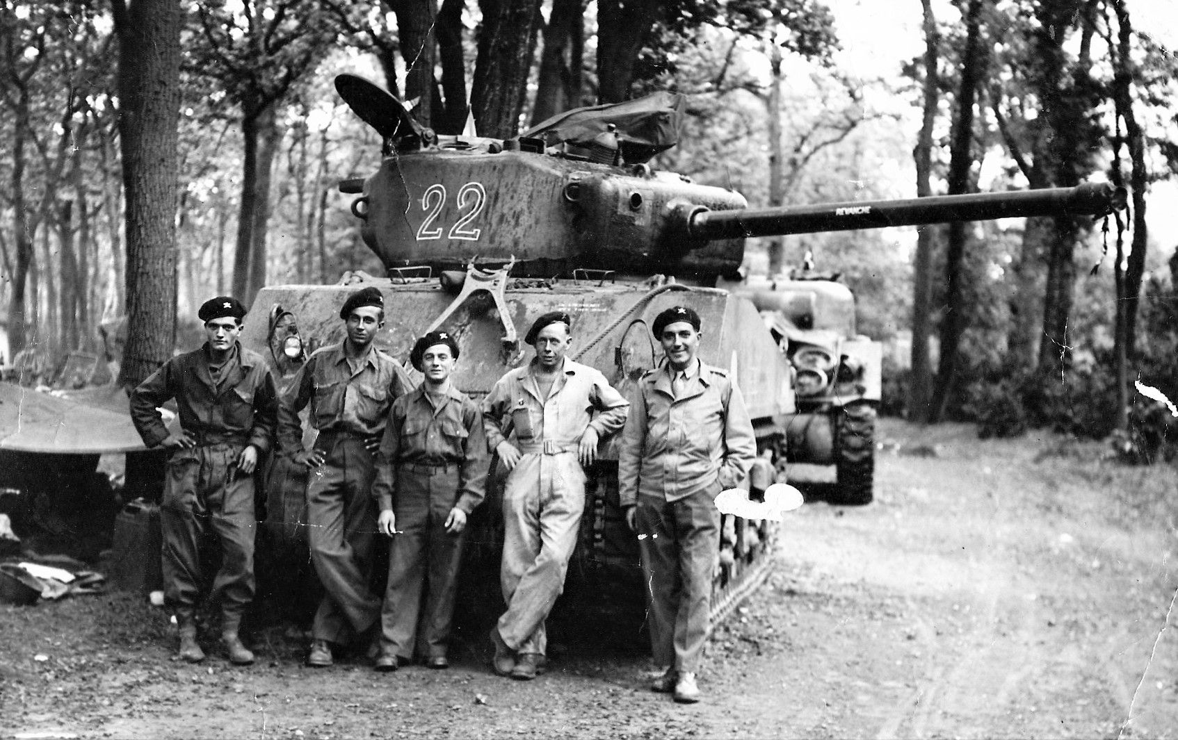 French crew on the background of the tank Sherman M4A2 (76) W of the 2nd company of the 501st Tank Regiment (2 Compagnie de Chars, 501 RCC)