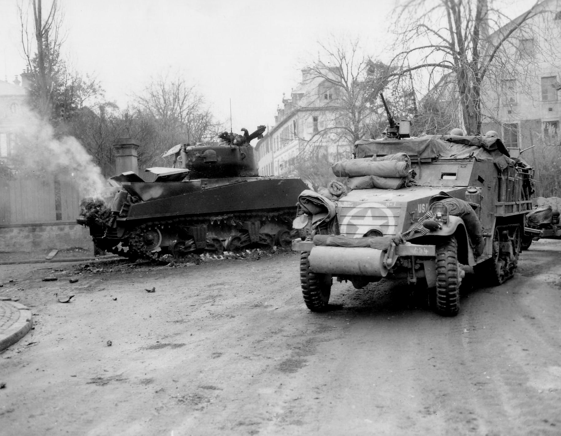 M3A1_Halftrack_burnedout_M4Sherman_1945_Warning_Tank Commander dead in turret