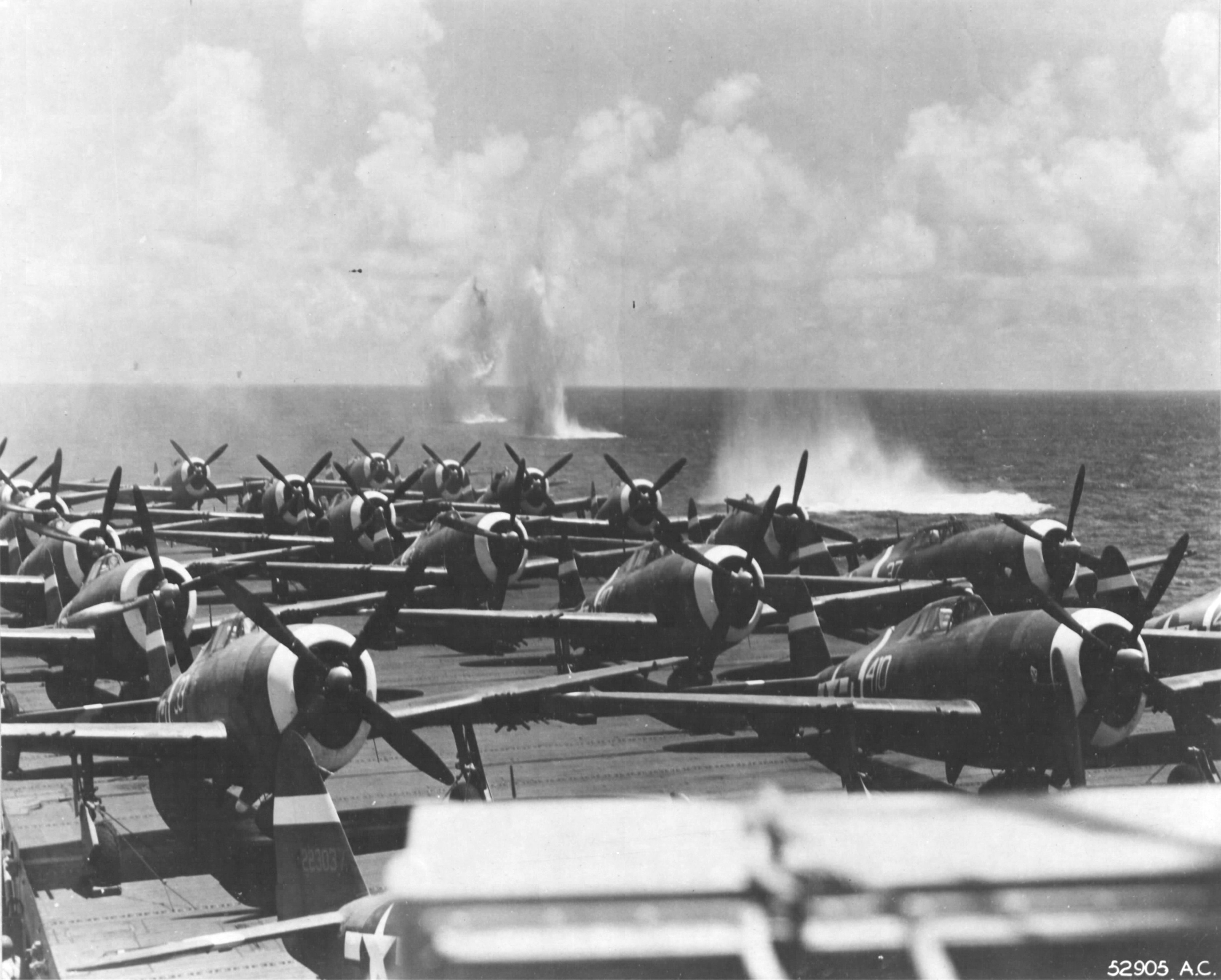 P-47Ds 73rd FS 318th FG 7th AF being ferried to Saipan on USS Manila Bay CVE-61. Attacked during refueling operations east of Saipan (appx 15.00, 147.00) by four Aichi Val dive bombers.