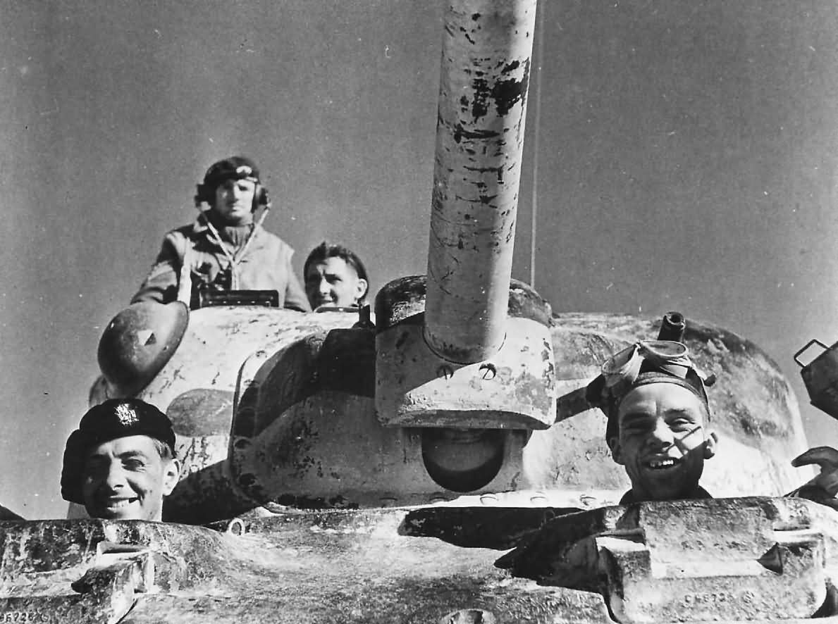 Smiling_British_Soldiers_in_M4_Sherman_Tank_1943